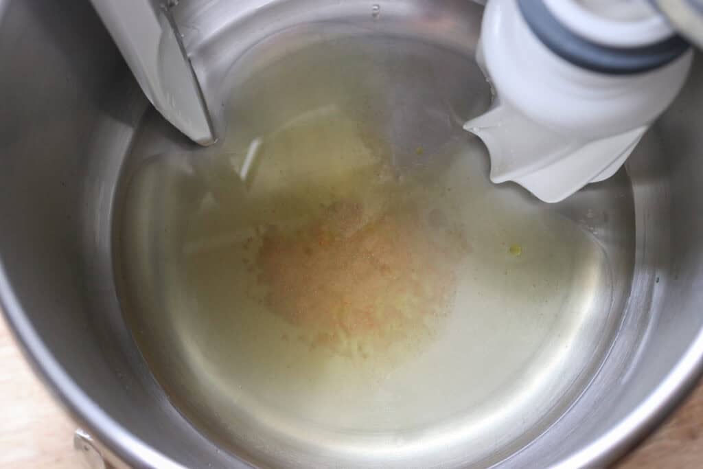 oil, honey, and salt in a mixing bowl to make freshly milled marbled rye bread