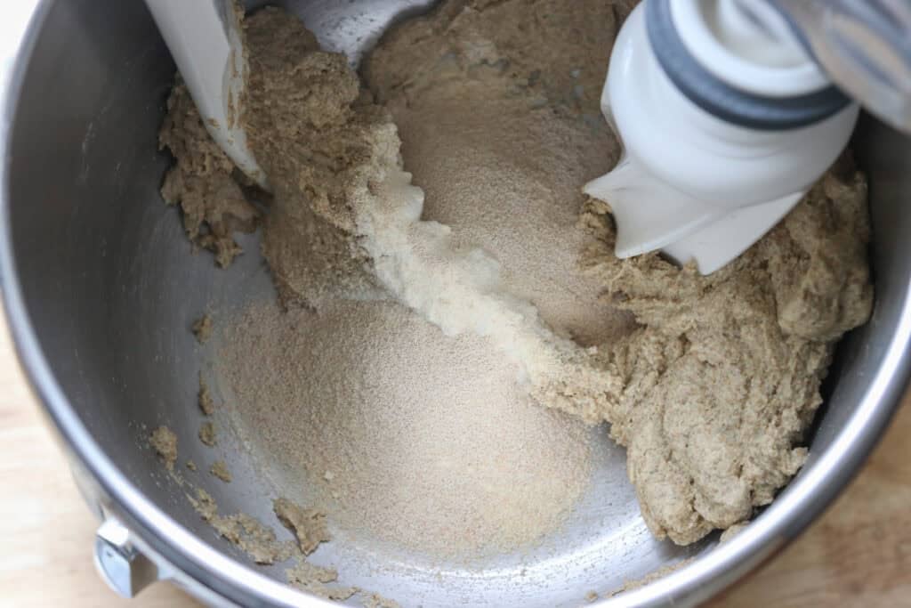 flour and yeast in a mixing bowl to make freshly milled marbled rye bread