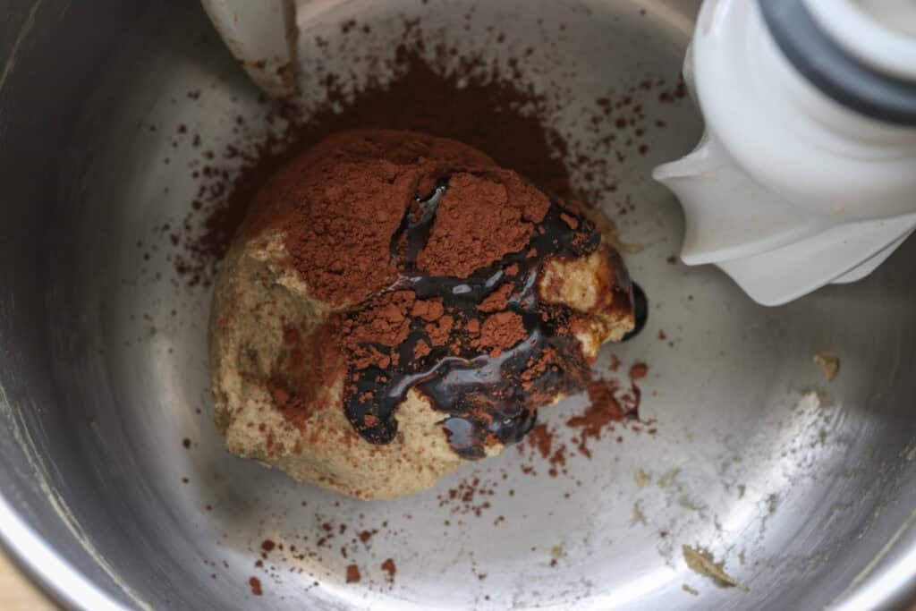 cocoa powder and molasses added to half of the dough for freshly milled marbled rye bread