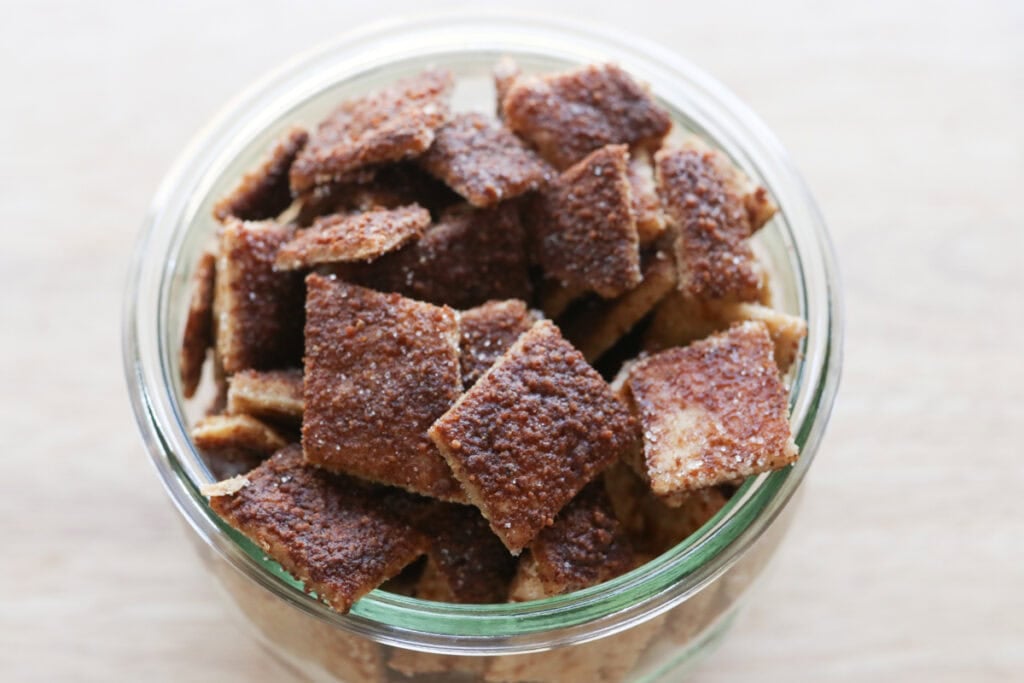 Homemade Fresh Milled Cinnamon Toast Crunch Cereal in a glass jar
