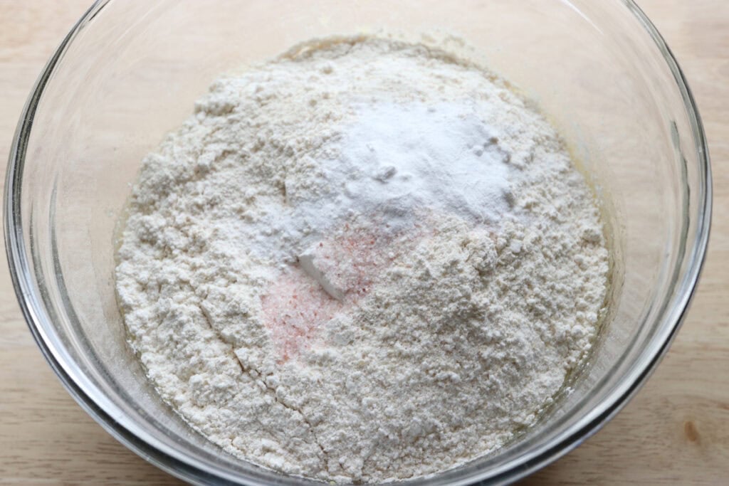 fresh milled flour added to the bowl for freshly milled glazed strawberry bread