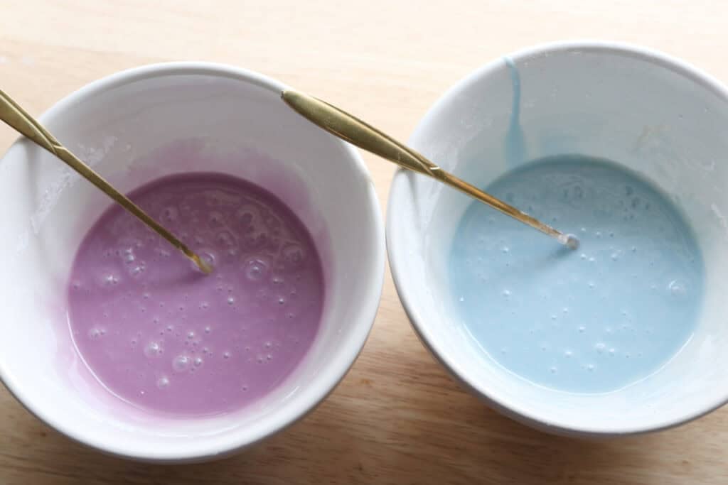 two bowls of icing to put on the Homemade Baked Spring Donuts with Fresh Milled Flour