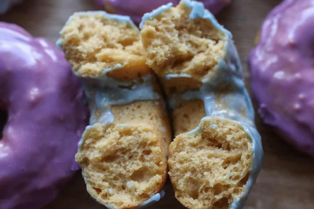 a Homemade Baked Spring Donut with Fresh Milled Flour that has been torn in half
