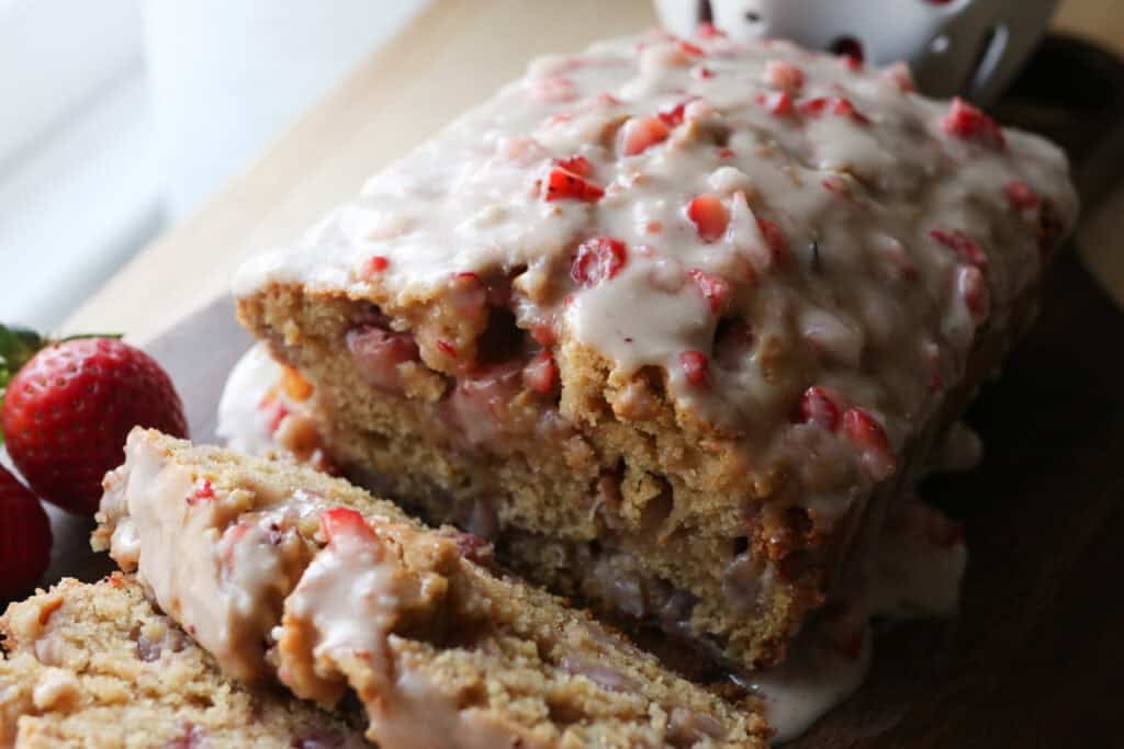 Freshly milled strawberry loaf bread with strawberry glaze on top