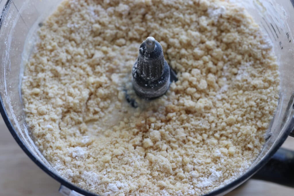 flour and butter that has been blended into small crumbs to make the dough for Fresh milled Easter egg sugar cookies