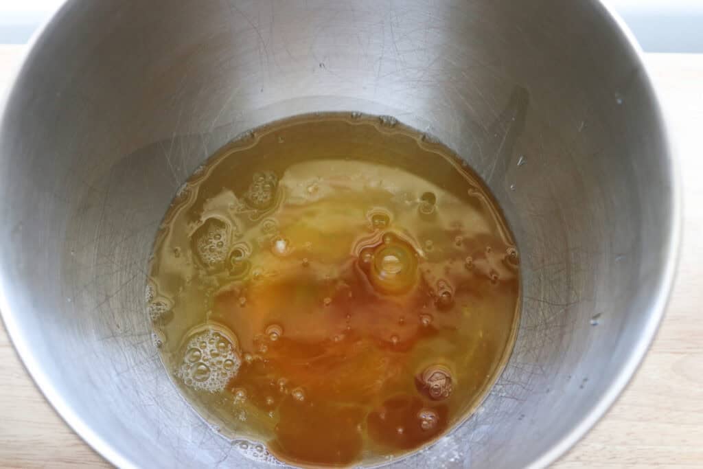 egg whites and vanilla in a mixing bowl to make freshly milled angel food cake