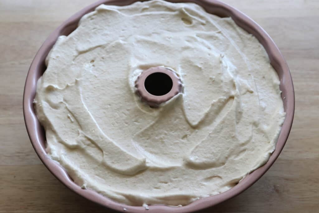 Freshly milled angel food cake batter in a bundt pan