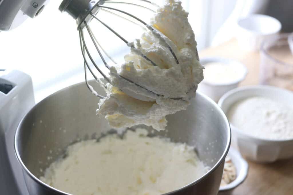 heavy cream that has been whipped to go in the fresh milled almond croissant cake
