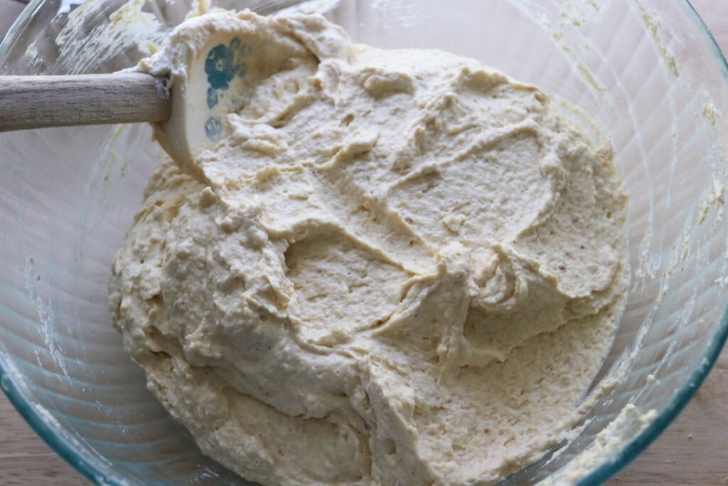 whipped cream that has been folded into the batter for fresh milled almond croissant cake