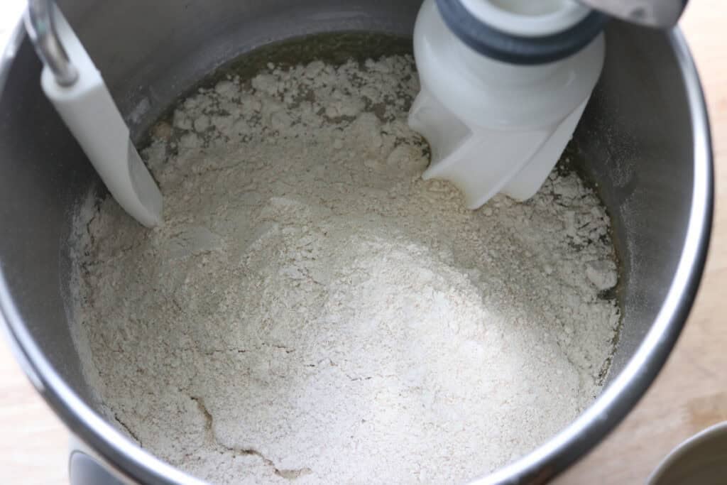 flour added to the bowl to make freshly milled einkorn sandwich bread