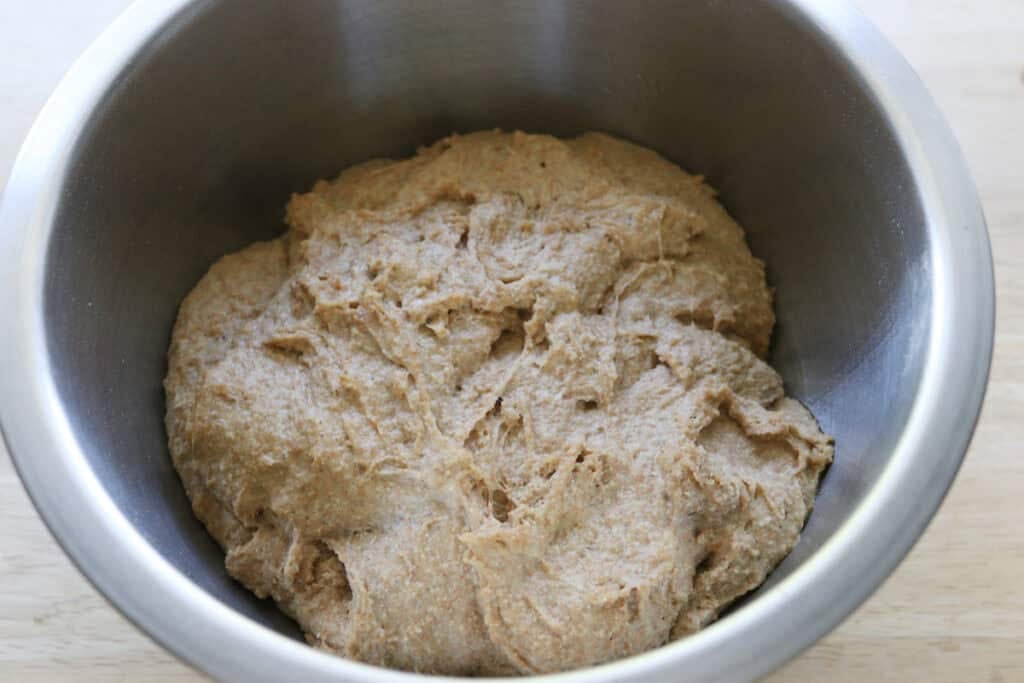 Freshly milled einkorn sandwich dough rising in a bowl 