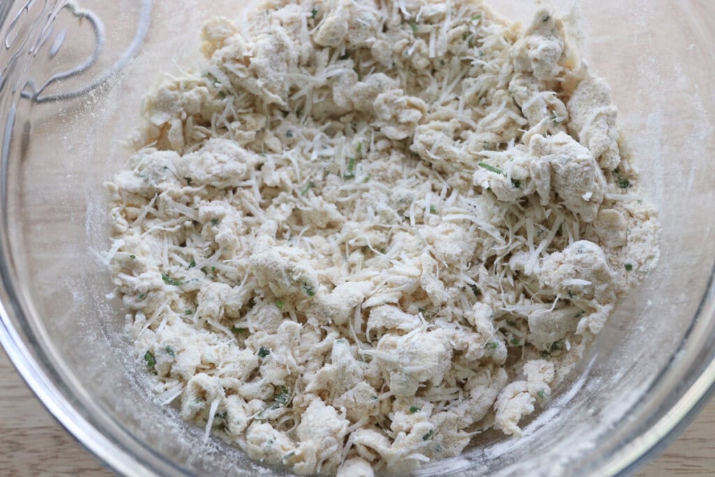 sour cream mixed into the dough to form coarse crumbs to make Easy Freshly Milled Parmesan Chive Drop Biscuits