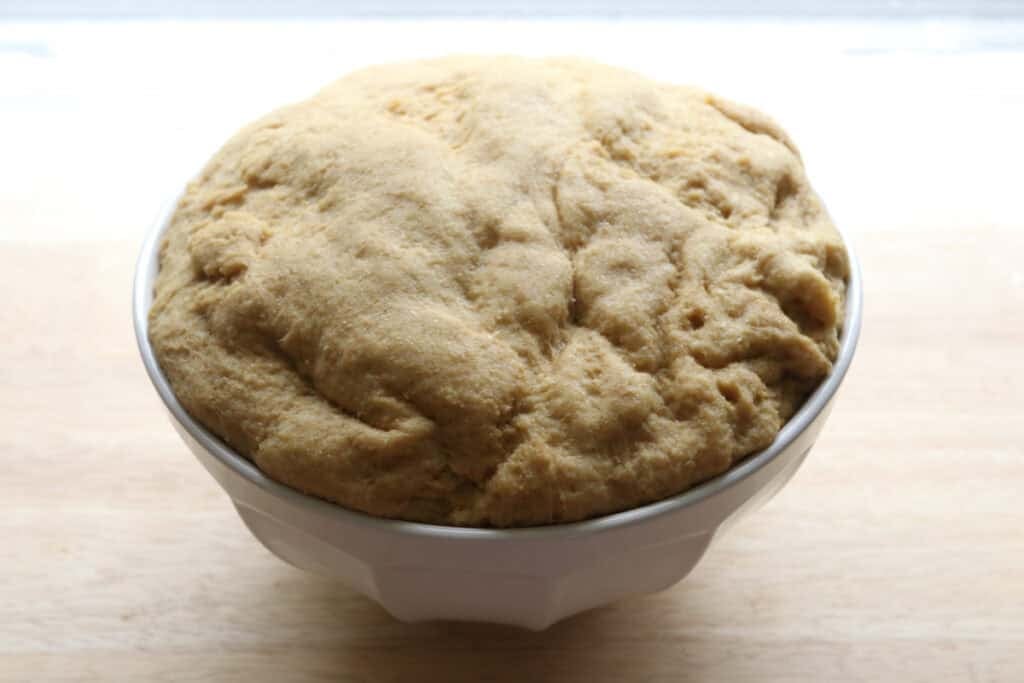 freshly milled lemon poppy seed dough that has risen 