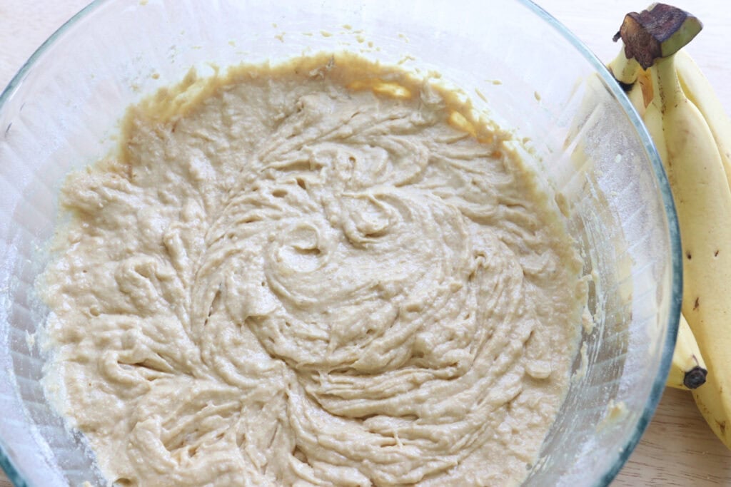 freshly milled frosted banana bar batter in a glass bowl