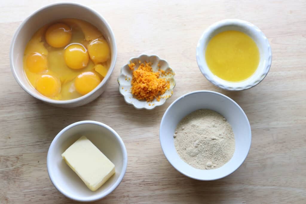ingredients to make the orange curd for the Freshly milled orange almond poppy seed cake