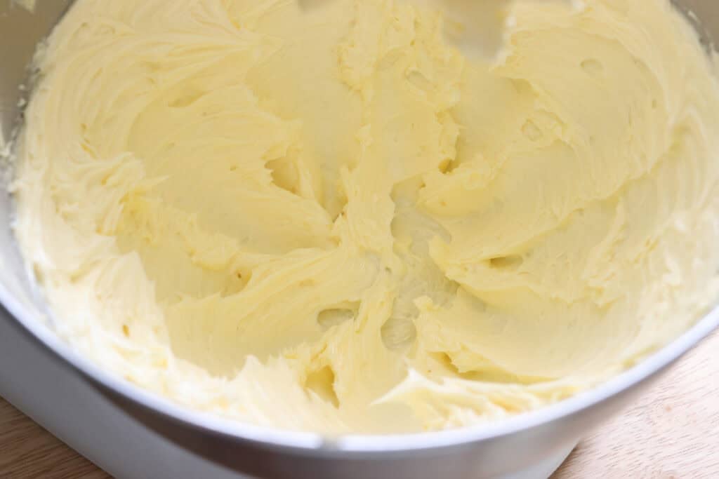 butter whipped for the icing for the Freshly milled orange almond poppy seed cake