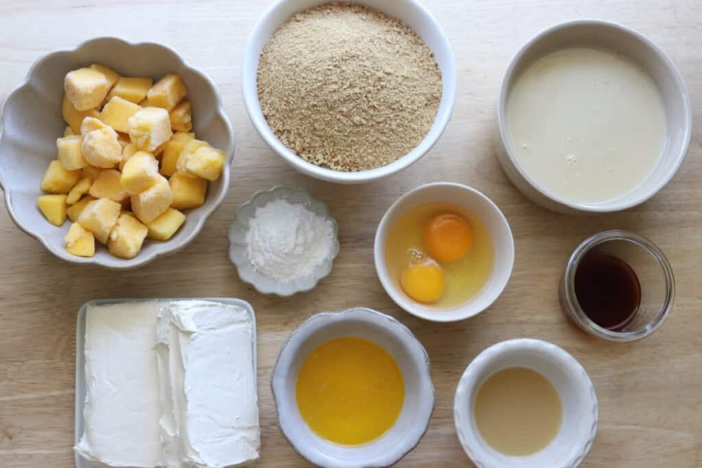 ingredients to make freshly milled mango cheesecake bars