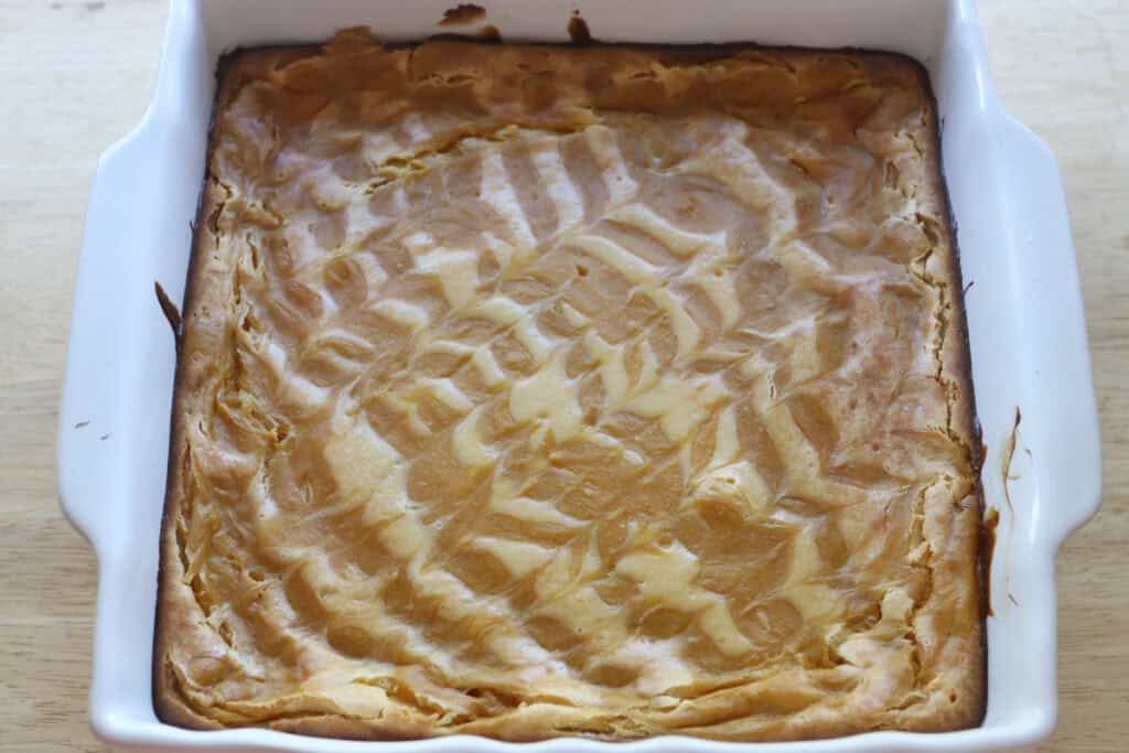 freshly milled mango cheesecake bars that have been baked