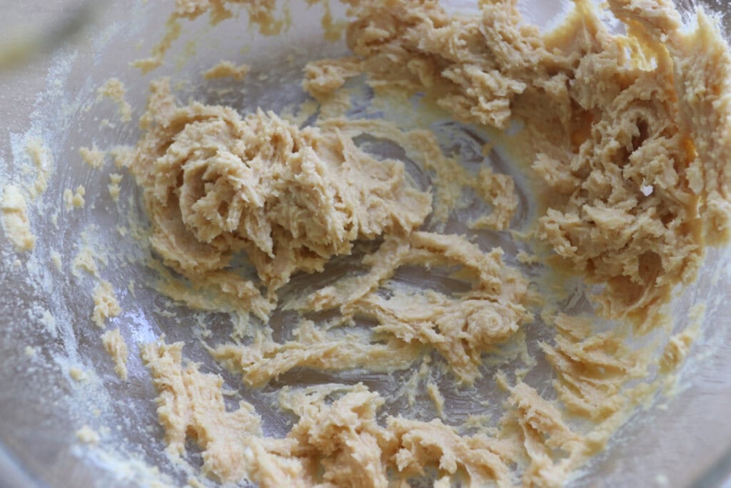butter and sugar mixed in a bowl to make Freshly milled cake pops