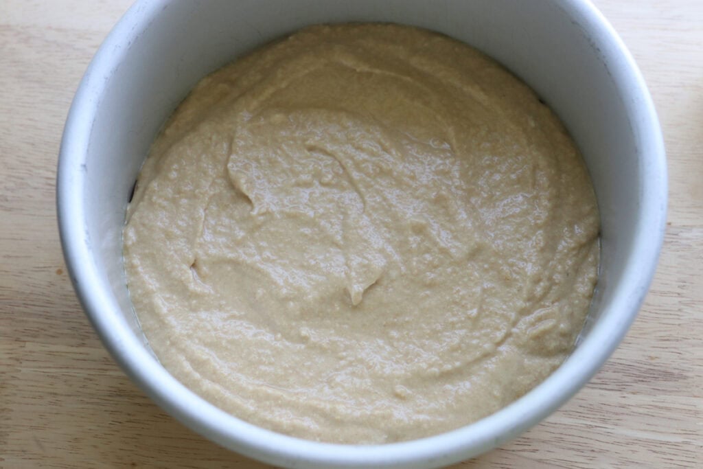 Freshly milled cake pop batter in a cake pan