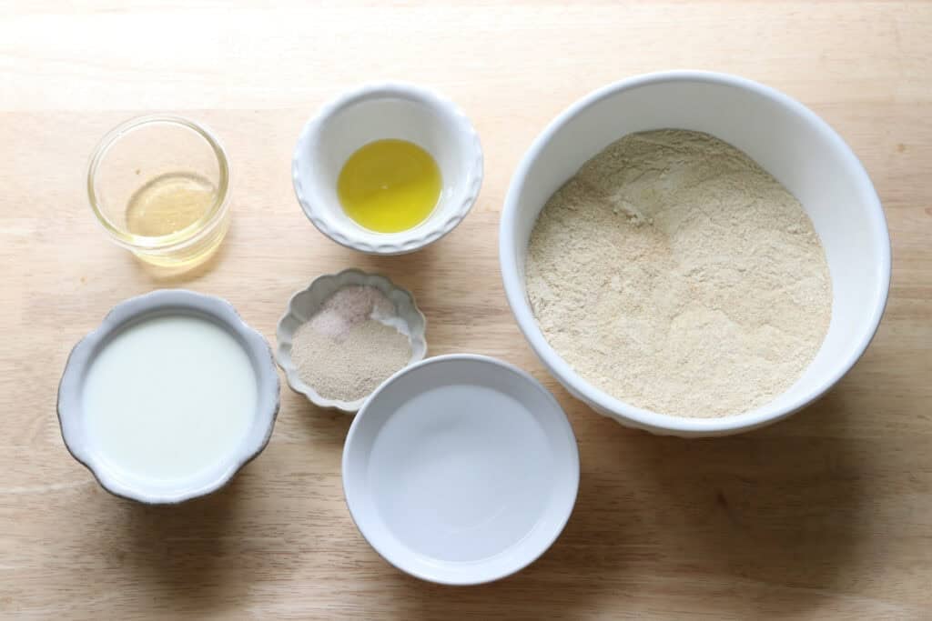 ingredients to make freshly milled english muffin toasting bread