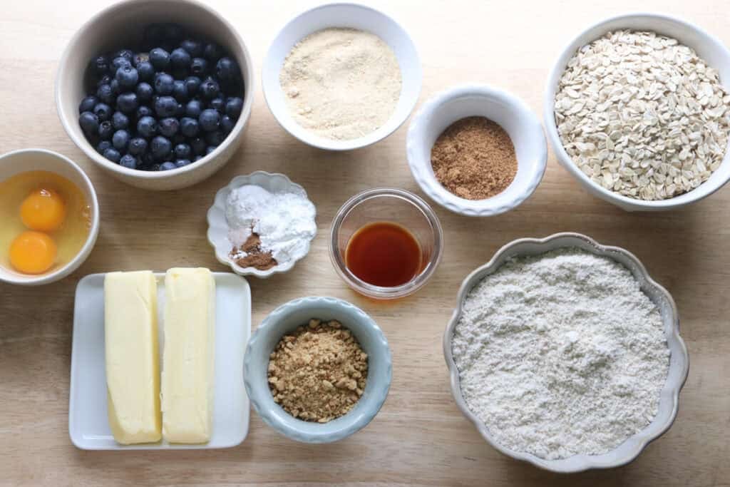 ingredients to make freshly milled blueberry cheesecake oatmeal cream pies