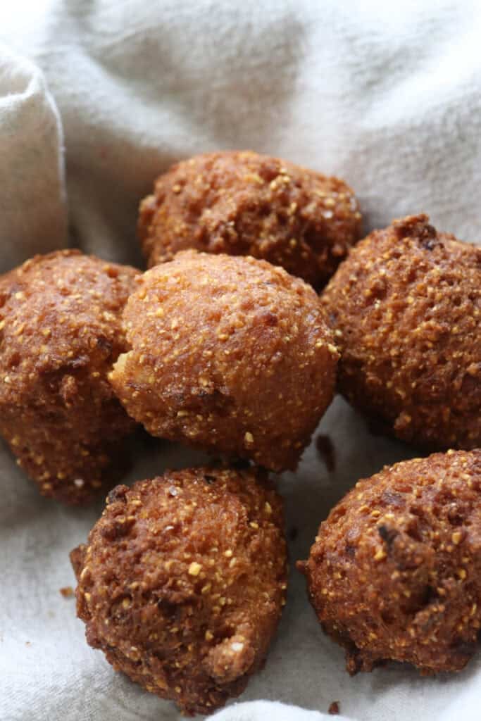 Crispy freshly milled hush puppies on a towel