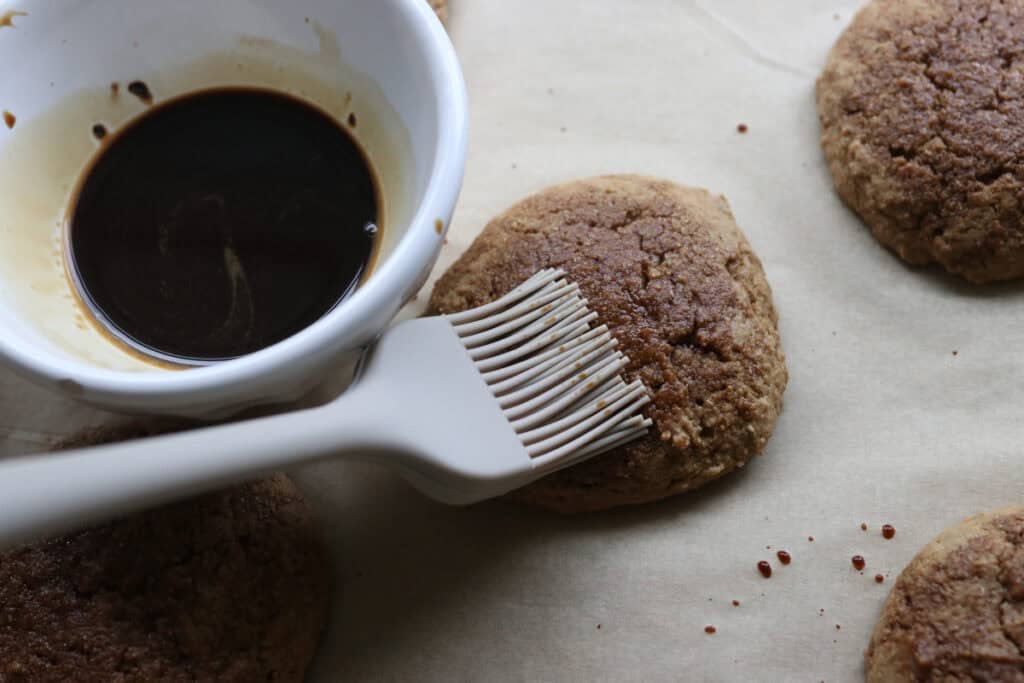 brushing instant coffee onto Freshly milled tiramisu cookies