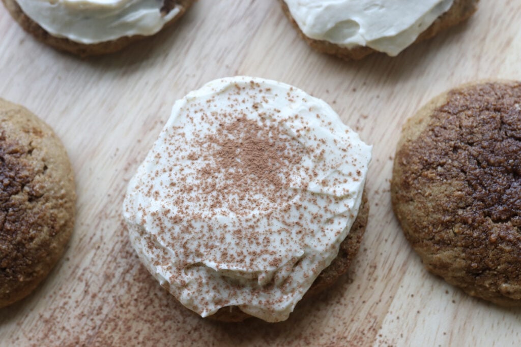 Freshly milled tiramisu cookies topped with icing and cocoa powder